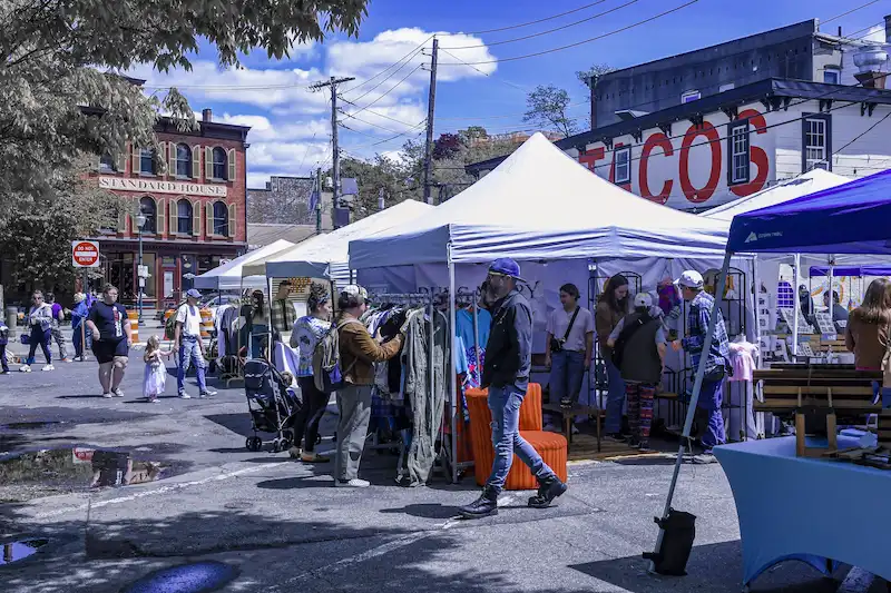 Visitors shop at the 2024 HOLIYAY! Market on Railroad Avenue in Peekskill, NY